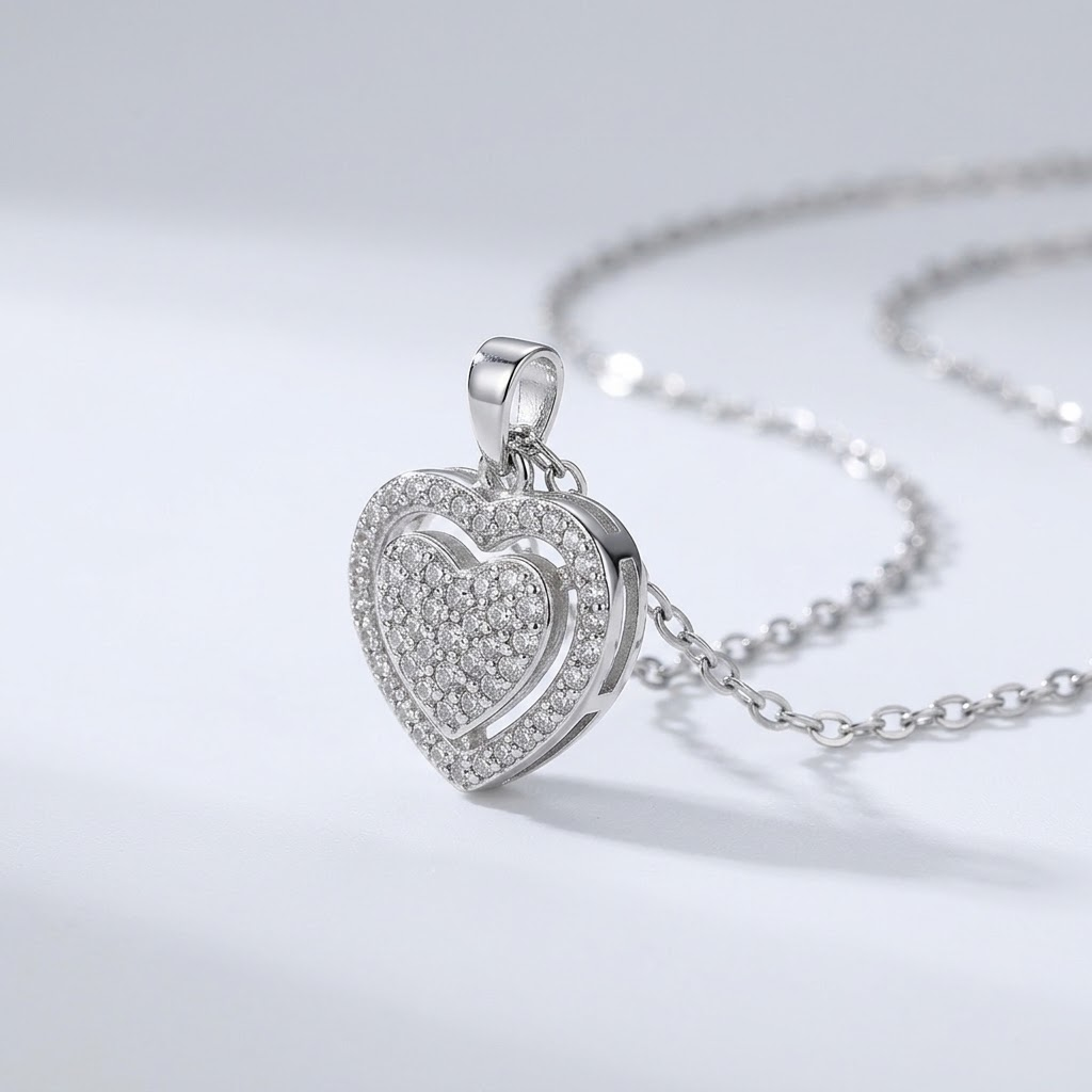 Pavé heart pendant side view showing pavé setting